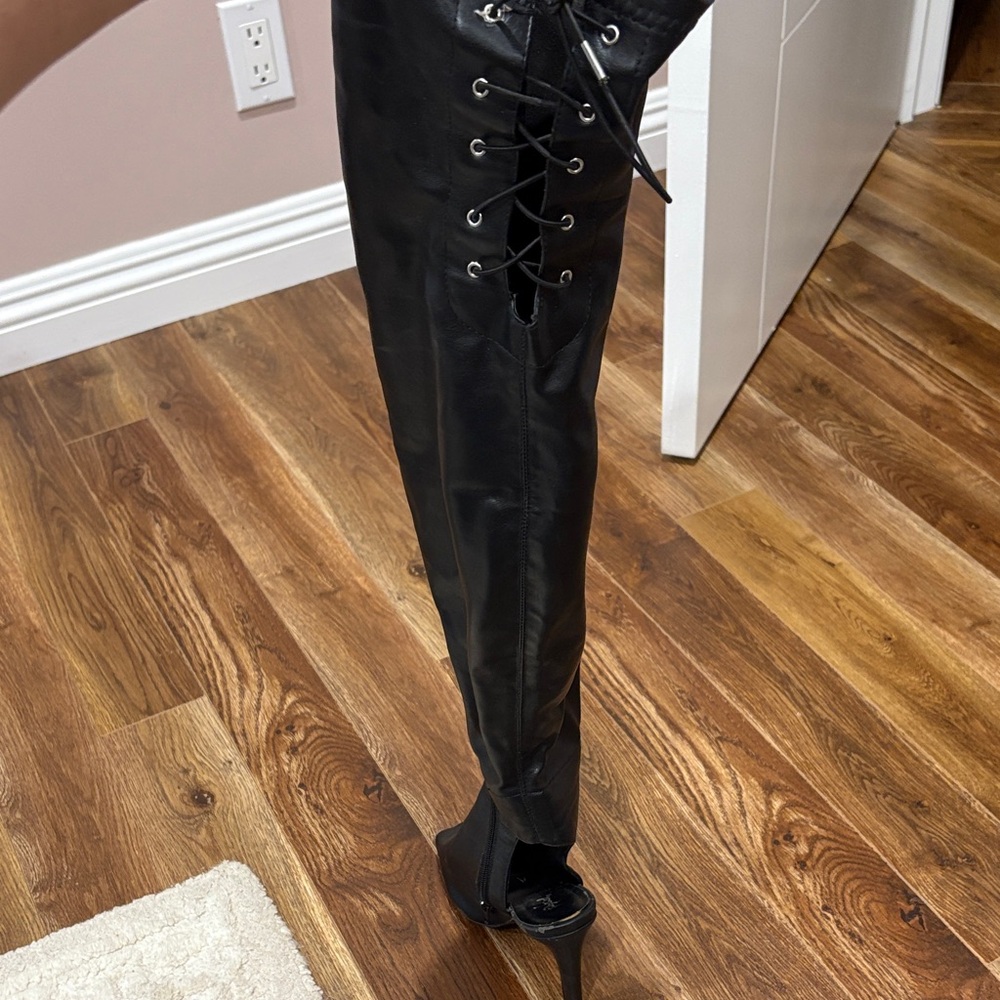 Sleek Black Lace-Up Heeled Boots